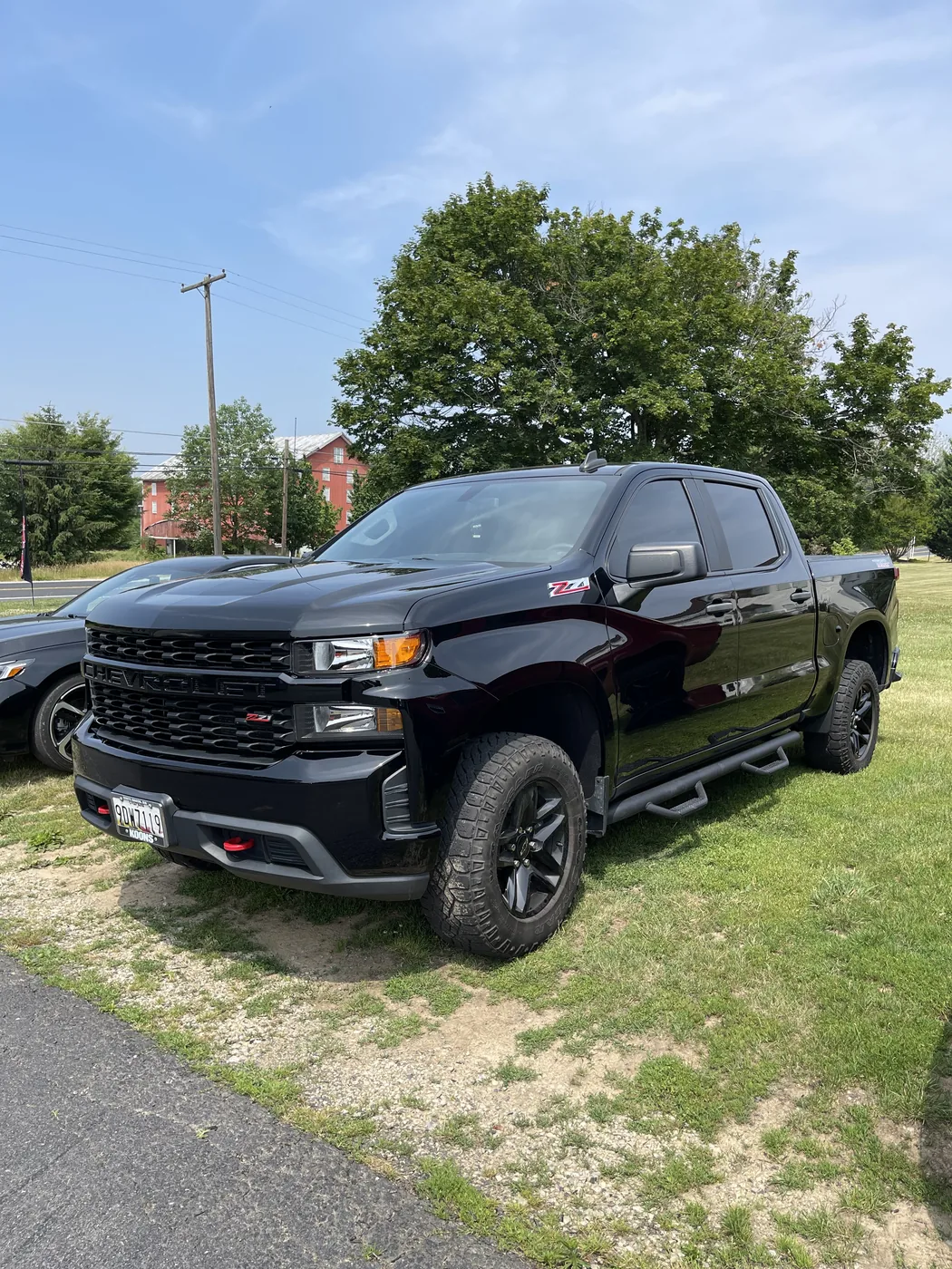 Black pickup truck after body repair