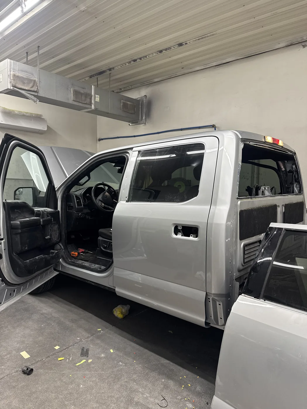 Silver truck cab during repair work